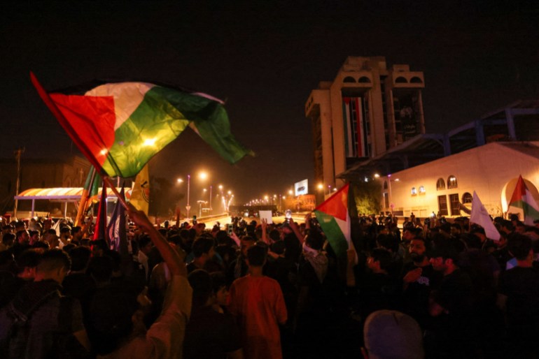 Iraqis take part in a protest after hundreds of Palestinians were killed in a blast at Al-Ahli hospital in Gaza that Israeli and Palestinian officials blamed on each other, in Baghdad, Iraq, October 18, 2023. REUTERS/Ahmed Saad