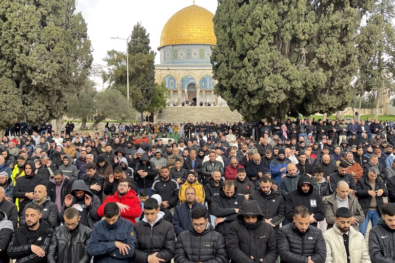 JERUSALEM - FEBRUARY 16: Palestinians perform Friday prayers near the Dome of the Rock of Masjid Al-Aqsa as the Israeli forces continue to impose restrictions during the 19th week in Jerusalem on February 16, 2024. (Photo by Mohammad Hamad/Anadolu via Getty Images)