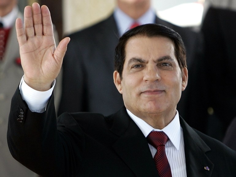 Tunisian President Zine El Abidine Ben Ali gestures upon the arrival of French President Nicolas Sarkozy at Tunis airport July 10, 2007. Sarkozy started a two-day official visit to Algeria and Tunisia. REUTERS/Francois Mori/ Pool (TUNISIA)