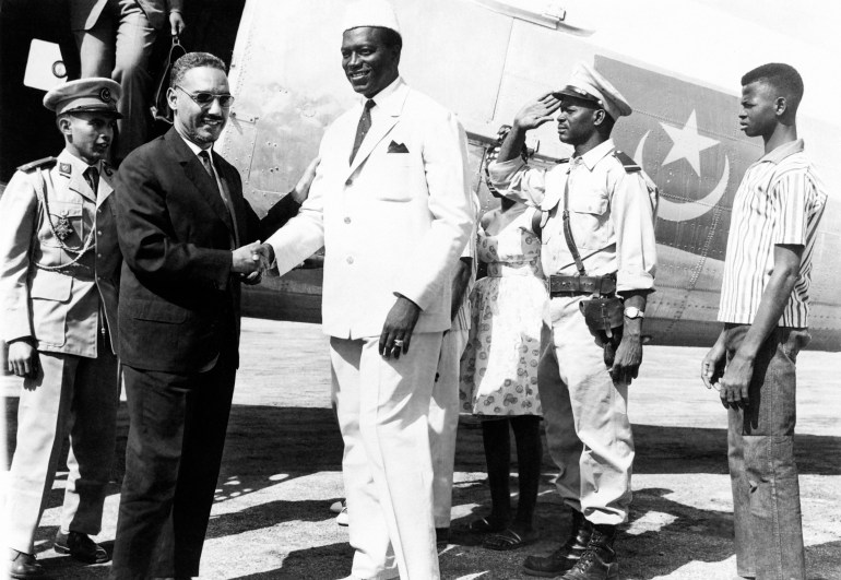 Picture released on February 1963 of Moktar Ould Daddah (L), president of Mauritania welcomed by Modibo Keita (R), president of Mali during his official visit in Mali to signe the Treaty of Kayes, a boundary agrrement between Mauritania and Mali, on February 16, 1963 at Kayes. (Photo by AFP)