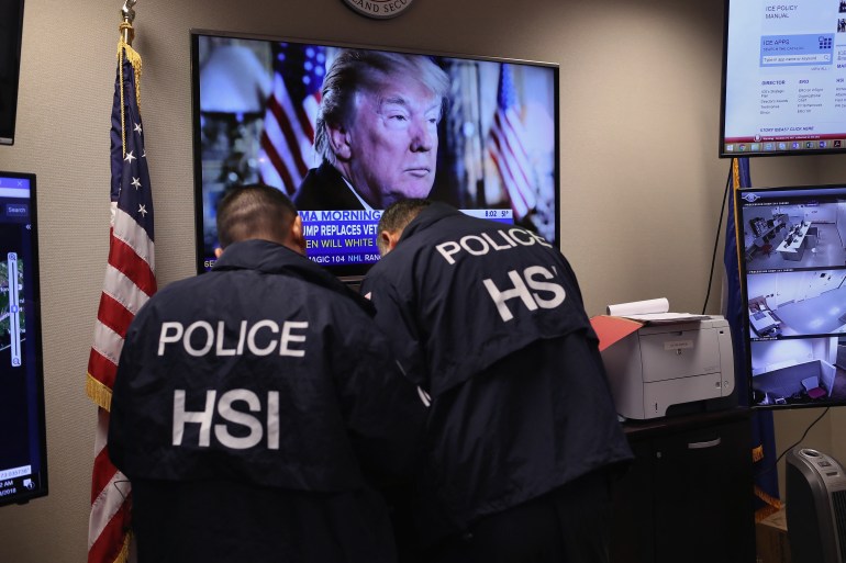 CENTRAL ISLIP, NY - MARCH 29: Homeland Security Investigations (HSI) ICE agents work in a control center during an operation targeting immigrant gangs in Central Islip, New York. Overnight and into the morning, U.S. federal agents and local police detained suspected gang members across Long Island in a surge of arrests. The actions were part of Operation Matador, a nearly year-long anti-gang effort targeting transnational gangs, with an emphasis on MS-13. John Moore/Getty Images/AFP (Photo by JOHN MOORE / GETTY IMAGES NORTH AMERICA / Getty Images via AFP)