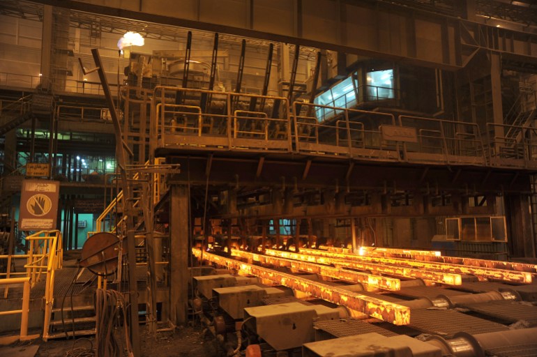 AHWAZ, IRAN - SEPTEMBER 28: Production line in Khuzestan steel company on September 28, 2011 in Ahwaz, Khuzestan province, southern Iran. Iran is seeking foreign investment for its projects in steel industry as well as oil and petrochemical projects. (Photo by Kaveh Kazemi/Getty Images)