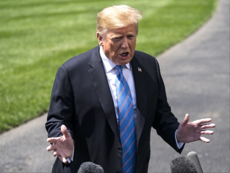 epa07570173 US President Donald J. Trump speaks to the media about China tariffs and the tensions with Iran, as he departs the White House for events in Louisiana, in Washington, DC, USA, 14 May 2019. Electronics imported from China, such as laptops and cellphones, could face tariffs as high as 25 percent should the President authorize another round of tariff hikes. EPA-EFE/JIM LO SCALZO