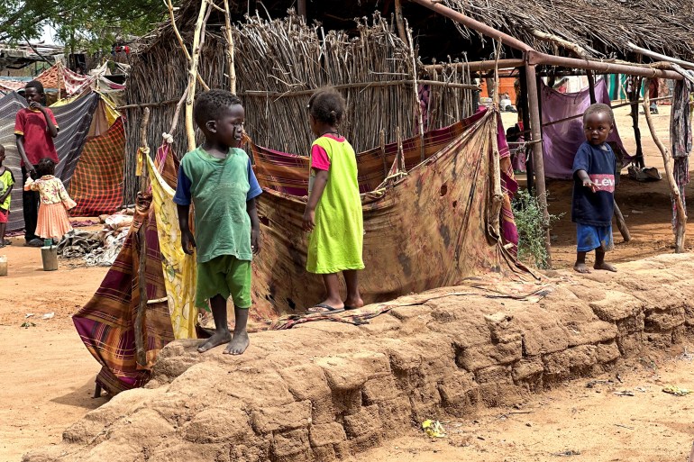 Displaced Sudanese children stand at Zamzam camp, in North Darfur, Sudan, August 1, 2024. REUTERS/Mohamed Jamal Jebrel