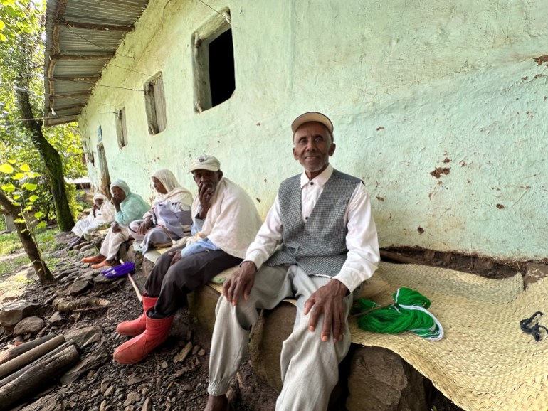 Occupants of the elderly people’s care home in Awra Amba [Peter Yeung/Al Jazeera]