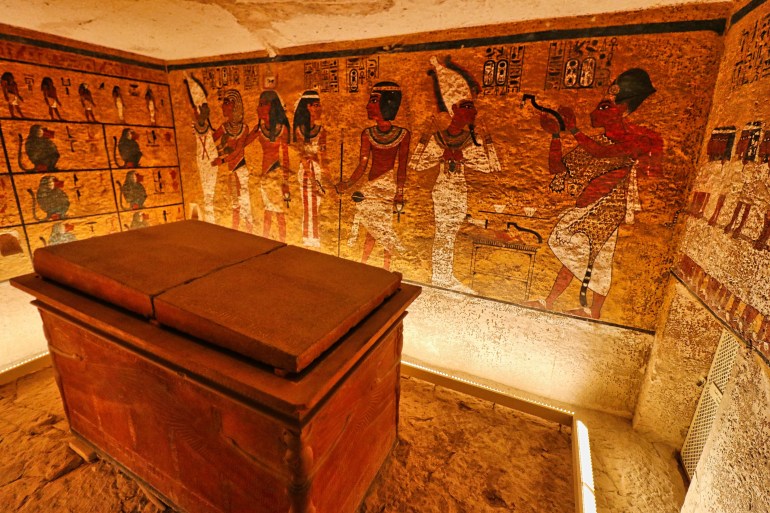 Luxor,Egypt,January 1,2020:Sarcophagus of Pharoah Tutankhamun with wall reliefs from the Book of the Dead inside the famous Tomb of Tutankhamun,KV62,found by Howard Carter in the Valley of Kings