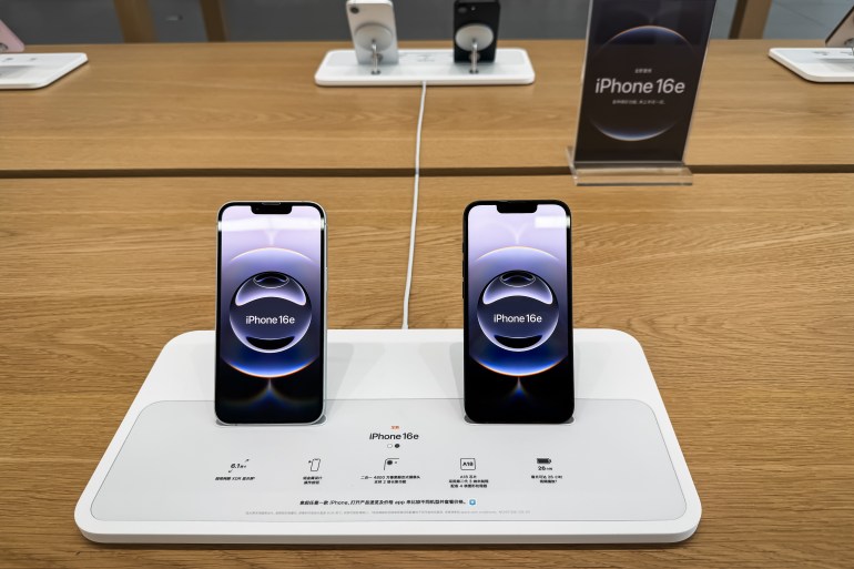 CHONGQING, CHINA - MARCH 1: The newly released iPhone 16e models are displayed on a demo stand inside an Apple Store at Chongqing MixC, showcasing their sleek design and features as part of Apple's latest product lineup on March 1, 2025 in Chongqing, China. (Photo by Cheng Xin/Getty Images)