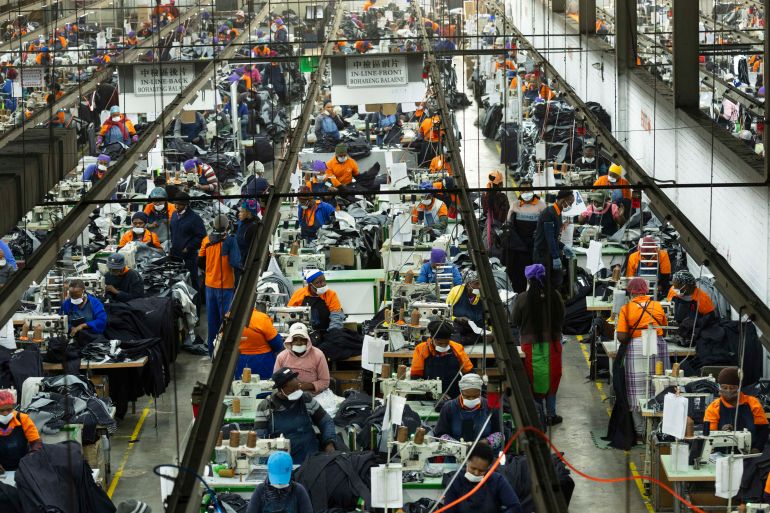 epa12022254 Workers at the Nien Hsing International Garment's Factory produce Levi jeans for the US market in Maseru, Lesotho, 10 April 2025. The mountain kingdom of Lesotho was initially subject to a 50 percent trade tariff imposed by the U.S. President Donald Trump. However, in line with most countries except China, the tariff has been reduced to 10 percent for a 90-day period. Lesotho’s garment industry, which primarily manufactures denim for brands such as Levi’s and Wrangler, includes eleven factories that supply directly to the U.S. market. EPA-EFE/KIM LUDBROOK