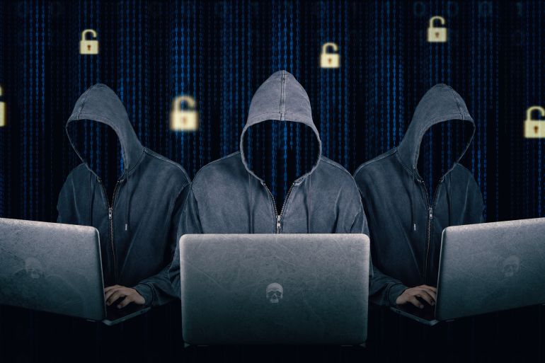 Dangerous hooded group of hackers. Internet, cyber crime, cyber attack, system breaking and malware concept. Dark face. Anonymous. Digital binary code on background.