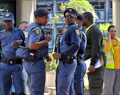 f_South African police patrol outside a hotel at Johannesburg Airport where relatives of the passengers killed in the Afriqiyah Airways Airbus A330 are gathered on May 12, 2010