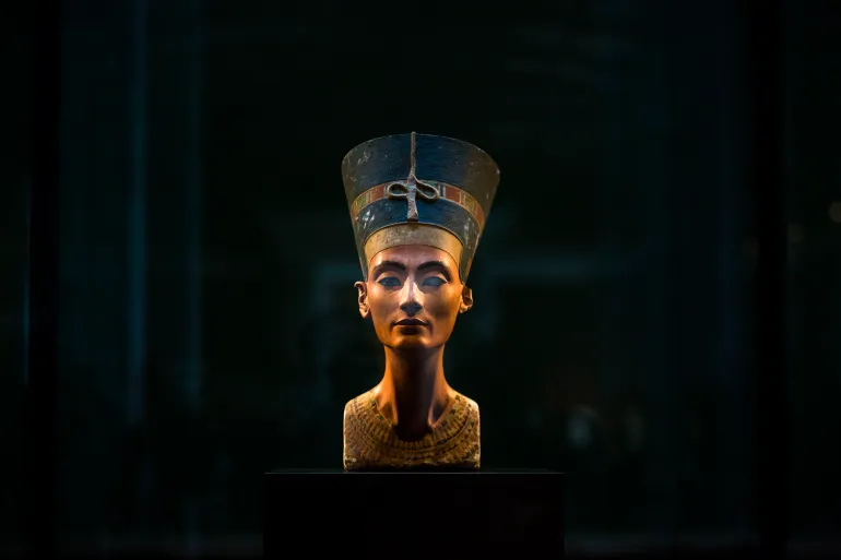 FILE - In this Sept. 10, 2014 file photo, a 3,300-year-old bust of Queen Nefertiti is displayed at the New Museum in Berlin, Germany. Egypt’s antiquities ministry said on Thursday, Nov. 26, 2015 exploration has begun inside King Tutankhamun’s 3,300 year-old tomb, in the search for alleged hidden chambers, one of which may include Queen Nefertiti, according to a new theory. (AP Photo/Markus Schreiber, File)