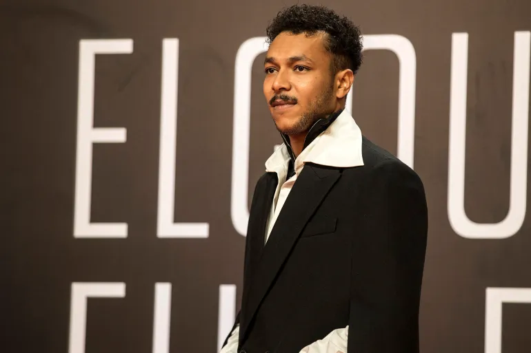 Egyptian rapper Ahmad Ali, known as Wegz poses on the red carpet during the closing session of the 5th edition of the Gouna Film Festival in Egypt's Red Sea resort of el-Gouna, on October 22, 2021. (Photo by Khaled DESOUKI / AFP)
