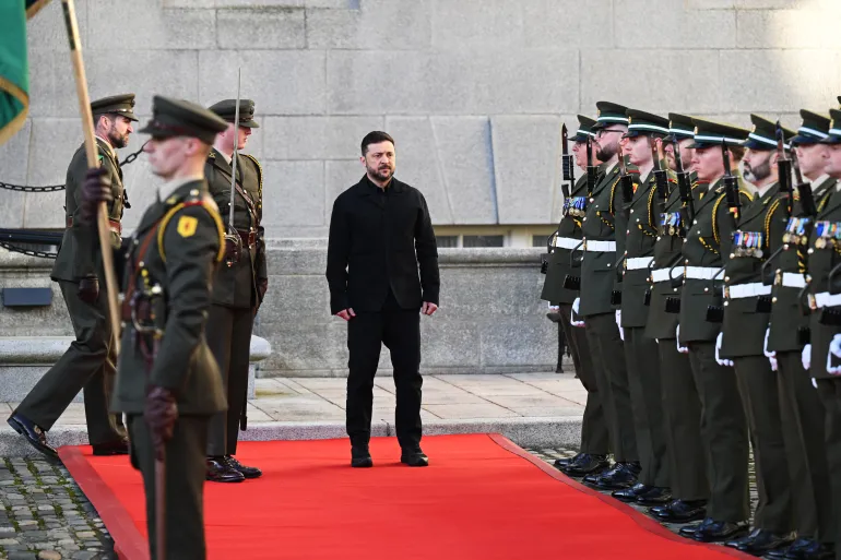 DUBLIN, IRELAND - DECEMBER 2: Ukrainian President Volodymyr Zelenskyy is welcomed by Military guard as he arrives at government buildings for a meeting with Ireland's Taoiseach Micheal Martin, on December 2, 2025 in Dublin, Ireland. The Ukrainian president and First Lady meet Ireland's Taoiseach for a bilateral meeting and inspects troops with the newly inaugurated Irish president Catherine Connolly. (Photo by Charles McQuillan/Getty Images)