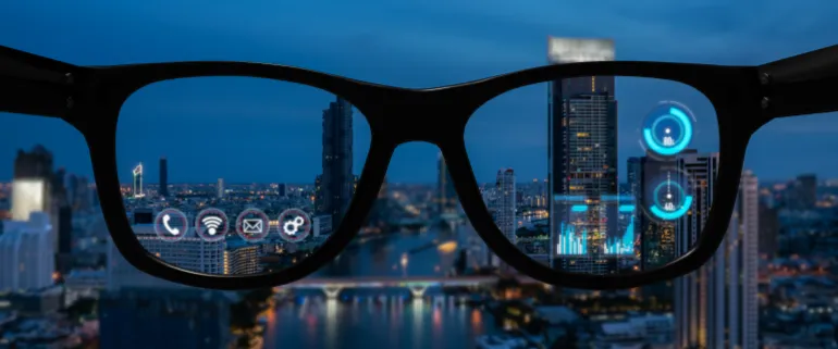 Futuristic smart glasses and vision concept.Smart glasses, VR virtual reality, and AR augmented reality technology. Smart glasses looking at the city with graphic hologram