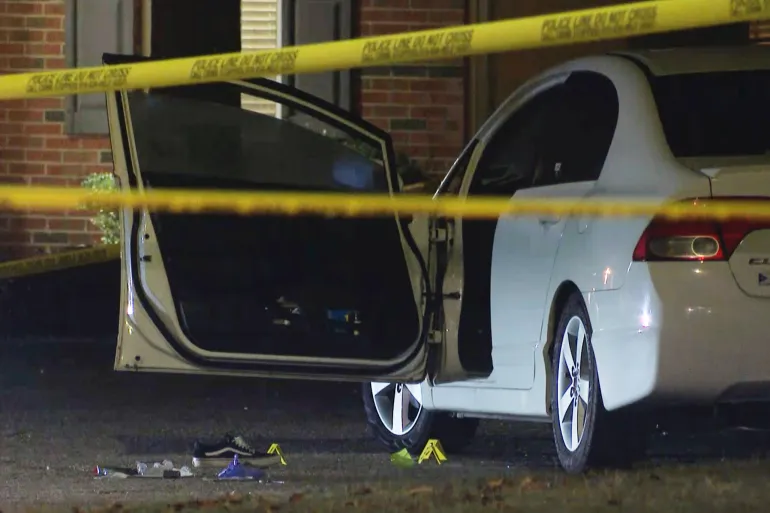 FILE - Law enforcement officers work a crime scene in the Hedingham neighborhood and Neuse River Trail area in Raleigh, N.C., Oct. 13, 2022. (AP Photo/Allen Breed, File)