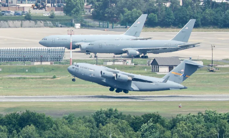 epa12192412 A Boeing C-17 Globemaster III transport aircraft of the US Air Force takes off from Ramstein Air Base in Landstuhl, Germany, 23 June 2025. Ramstein Air Base is a military airfield of the United States Air Force and serves as its European headquarters. EPA/RONALD WITTEK