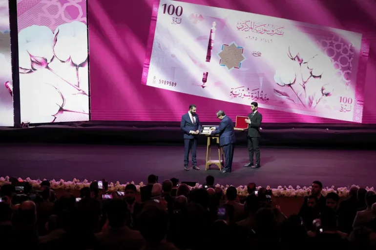 المصدر: وكالة سانا الرئيس أحمد الشرع خلال إطلاق العملة السورية الجديدة