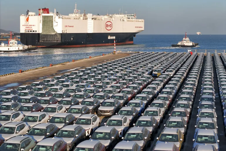 (FILES) This photograph taken on January 10, 2024 shows electric cars for export waiting to be loaded on the "BYD Explorer NO.1", a domestically manufactured vessel intended to export Chinese automobiles, at Yantai port, in eastern China's Shandong province.