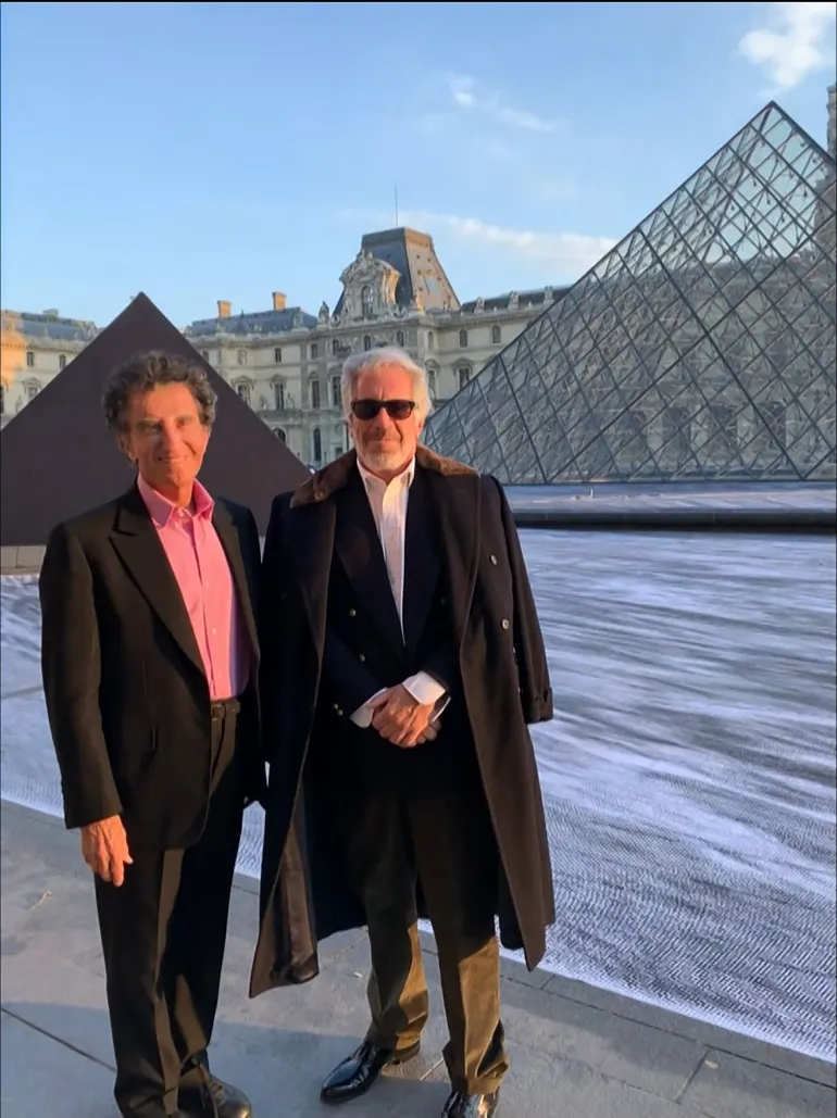 A screengrab taken on February 3, 2026 from a video released in files related to the investigation into the late convicted sex offender Jeffrey Epstein, published by the US Department of Justice, shows Jack Lang, a French former culture minister posing with Jeffrey Epstein at the Louvre pyramid in Paris.