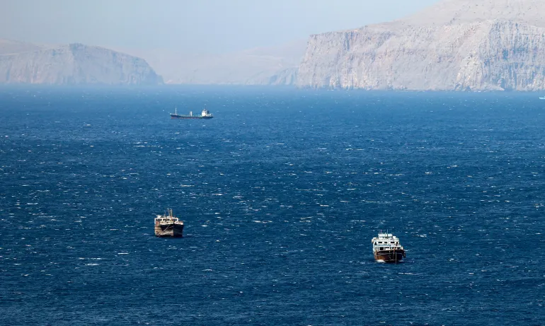 epa12194514 Ships in the Strait of Hormuz as seen from Khasab, Musandam Governorate, Oman, 24 June 2025. The Iranian parliament approved a measure to close the Strait of Hormuz following US strikes on three of Iran's key nuclear sites on 22 June 2025. Israel and Iran have been exchanging fire since Israel launched strikes across Iran on 13 June 2025. EPA/ALI HAIDER