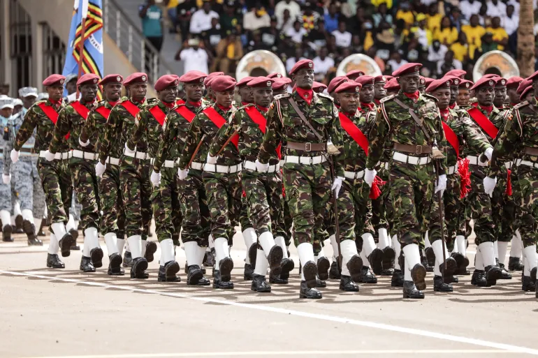 KAMPALA, UGANDA - MAY 13: Uganda Special Forces presenting match past at the Chief of Defense Forces Inter Force Drill Competition on May 13, 2025 in Kampala, Uganda. The event's guest of honor was General Muhoozi Kainerugaba, chief of the UPDF and the eldest son of Ugandan President Yoweri Museveni. (Photo by Hajarah Nalwadda/Getty Images)