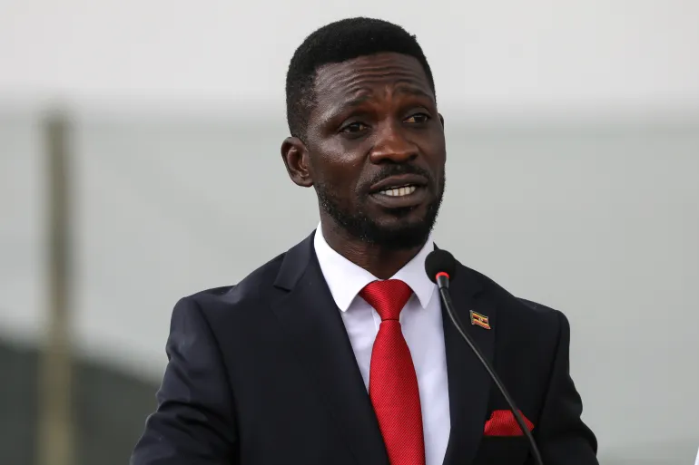 WAKISO, UGANDA - SEPTEMBER 24: Bobi Wine addressing the press after being nominated for presidential elections 2026 at the Electoral Commission offices in Lweza on September 24, 2025 in Wakiso District, Uganda. Uganda's next general election is scheduled to be held on January 12, 2026. Nominations are taking place to determine challengers to President Yoweri Museveni, who at age 80 is seeking to remain in office as the presidential nominee for the National Resistance Movement (NRM), the governing party he has led since ousting the former military regime during an armed uprising in 1986. (Photo by Hajarah Nalwadda/Getty Images)