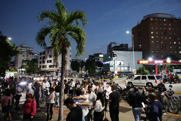 CARACAS, VENEZUELA - JANUARY 08: Relatives of prisoners arrive for the release of political prisoners at El Helicoide on January 08, 2026 in Caracas, Venezuela. Venezuelan political prisoners Enrique Márquez and Biagio Pilieri, along with at least five detained people, have been released after Jorge Rodriguez, President of the Parliament, announced that they would be releasing "an important number" of prisoners, both venezuelan and foreigners, five days after Nicolas Maduro was captured by US forces. (Photo by Jesus Vargas/Getty Images)