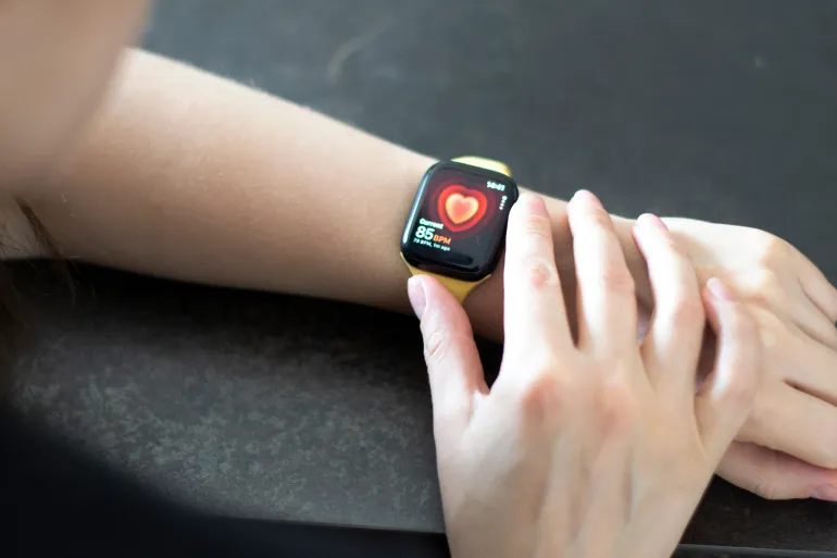 San Francisco, USA - September 4, 2024: Woman hand with Apple Watch Series 8 measuring heart rate. Apple Watch was created and developed by the Apple inc.