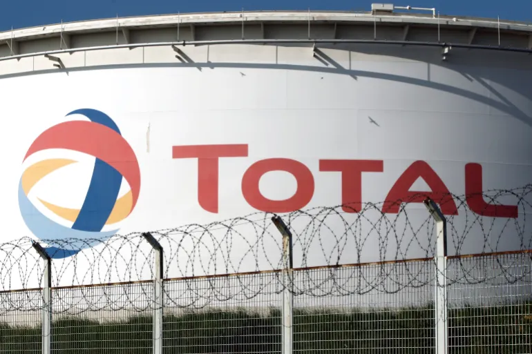 View of a storage tank at the French oil giant Total refinery of Grandpuits, southeast of Paris, October 13, 2010. French workers protesting against pension reform said they had halted supplies from most of the country's oil refineries on Wednesday and were also blocking some fuel depots as the risk grew of shortages at petrol pumps. REUTERS/Charles Platiau (FRANCE - Tags: ENERGY EMPLOYMENT BUSINESS CIVIL UNREST)