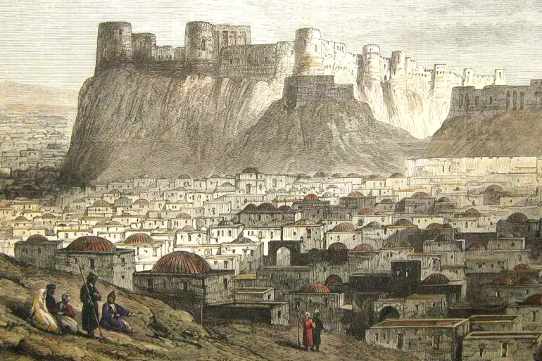 The Citadel of Herat (Persian: ___ _____, Pashto ______ ___), also known as the Citadel of Alexander, and locally known as Qala Iktyaruddin (Persian: ____ ____________), is located in the center of Herat in Afghanistan. It dates back to 330 BCE, when Alexander the Great and his army arrived to what is now Afghanistan after the Battle of Gaugamela. Many empires have used it as a headquarters in the last 2,000 years, and was destroyed and rebuilt many times over the centuries. This historic citadel was saved from demolition in the 1950s, and was excavated and restored by UNESCO between 1976 and 1979. From decades of wars and neglect, the citadel began to crumble but in recent years several international organizations decided to completely rebuild it. The National Museum of Herat is also housed inside the citadel, while the Afghan Ministry of Information and Culture is the caretaker of the whole premises. (Photo by: Pictures from History/Universal Images Group via Getty Images)