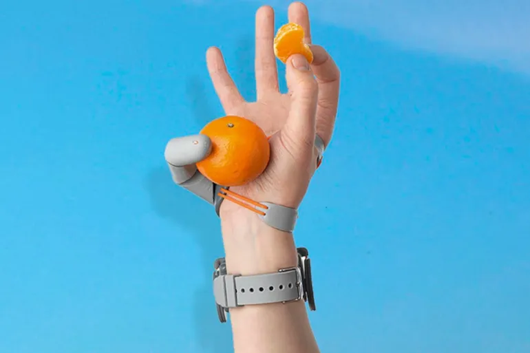 Scientists from University College London have recently developed a glove-like device that gives the wearer an additional thumb - Image credit: Dani Clode/UCL