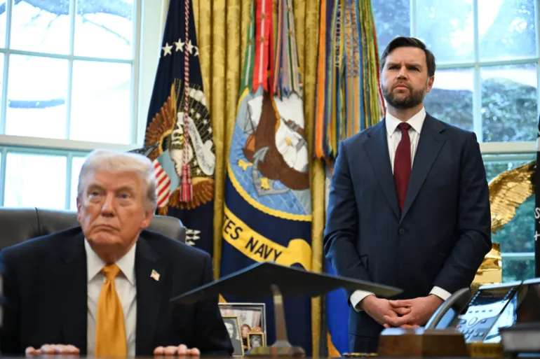 US President Donald Trump and Vice President JD Vance listen to a repoerter's question after Trump signed an executive order on fraud in the Oval Office at the White House in Washington, DC, on March 16, 2026. (Photo by ANNABELLE GORDON / AFP)
