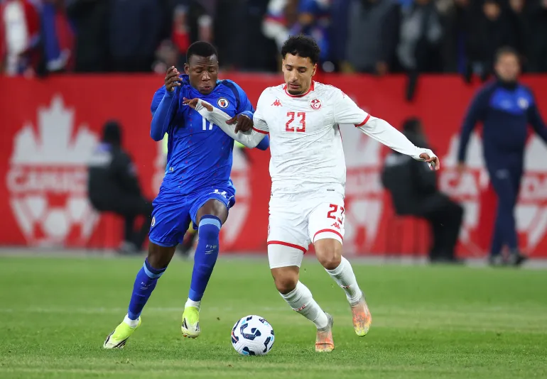 TORONTO, ON - MARCH 28: Sayfallah Ltaief #23 of Tunisia and Danley Jean-Jacques #17 of Haiti battle for the ball during an International Friendly at BMO Field on March 28, 2026 in Toronto, Ontario, Canada. Vaughn Ridley/Getty Images/AFP (Photo by Vaughn Ridley / GETTY IMAGES NORTH AMERICA / Getty Images via AFP)