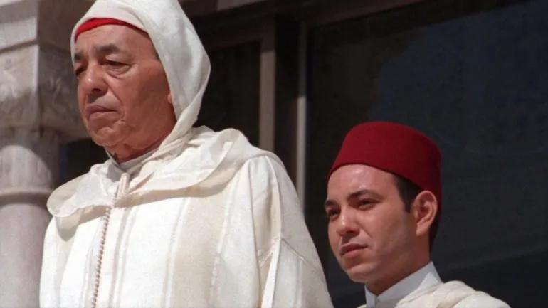 A picture dated 03 March 1997 of Moroccan King Hassan II (L), flanked by his son, Crown Prince Sidi Mohammed (R), hearing the presentation of greetings in the 36th anniversary ceremony of the monarch's enthronement in Rabat. King Hassan II of Morocco died 23 July, 1999 after being hospitalised earlier in the day with an acute pneumopathy, sources close to the royal palace said.