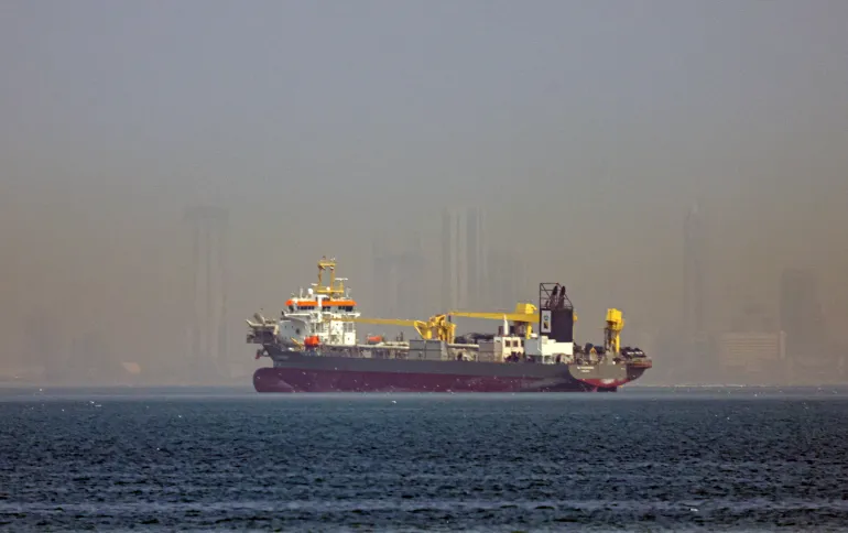 epa12787003 A vessel is seen anchoring off the coast of Dubai, United Arab Emirates, 01 March 2026. Following a joint Israel-US military operation targeting multiple locations across Iran in the early hours of 28 February 2026 and Iran's retaliatory attacks across the region, many ships are anchored as Iran threatened to close the Strait of Hormuz, where hundreds of ships carrying oil pass daily, potentially affecting worldwide trade. EPA/STRINGER