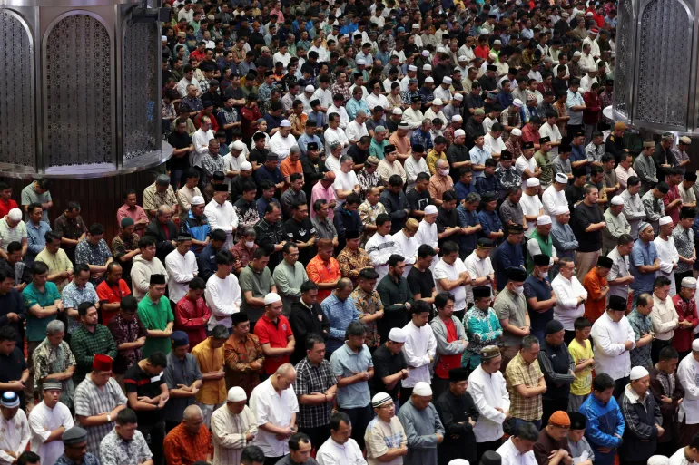 Muslim men attend the first Friday prayers during the holy fasting month of Ramadan at the Istiqlal Mosque, in Jakarta, Indonesia, February 20, 2026. REUTERS/Ajeng Dinar Ulfiana