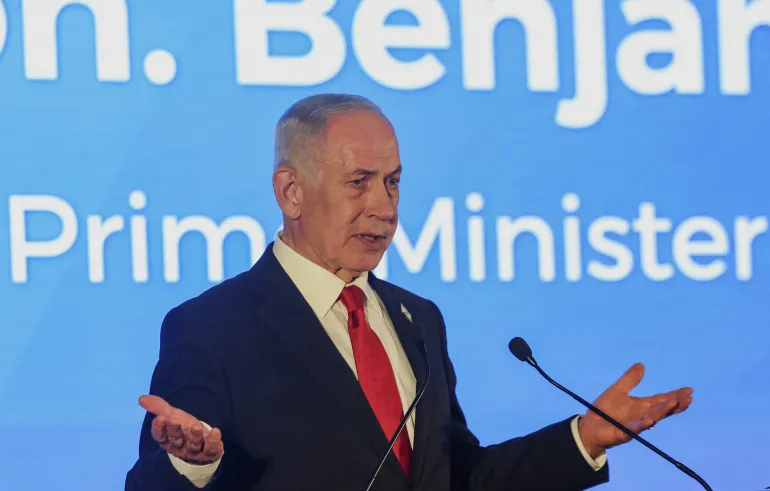 Israeli Prime Minister Benjamin Netanyahu gestures as he speaks during the Conference of Presidents of Major American Jewish Organisations, in Jerusalem, February 15, 2026. REUTERS/Ronen Zvulun