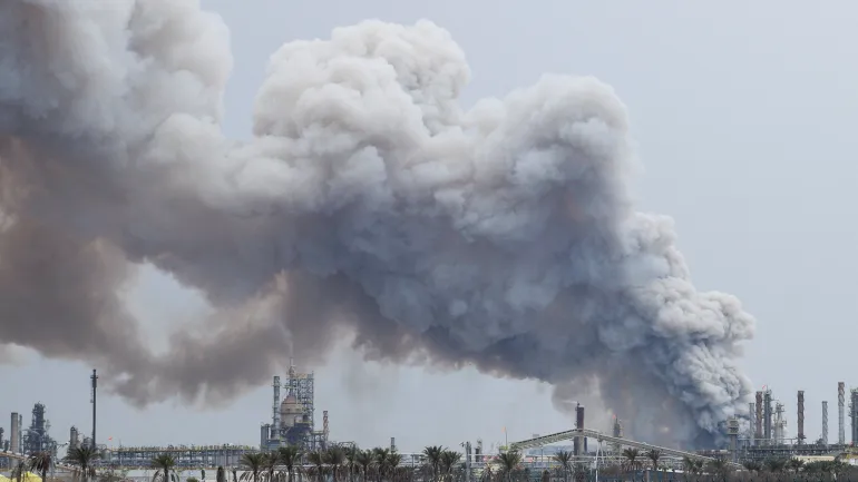 Smoke rises following a strike on the Bapco Oil Refinery, amid the U.S.-Israeli conflict with Iran, on Sitra Island Bahrain, March 9, 2026. REUTERS/Stringer