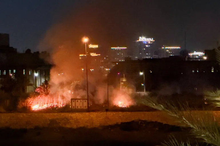 Smoke rises after an explosion at the U.S. Embassy compound in Baghdad, Iraq, following a rocket and drone attack, according to security sources, March 17, 2026. Picture taken with a mobile phone. REUTERS/Maher Nazeh