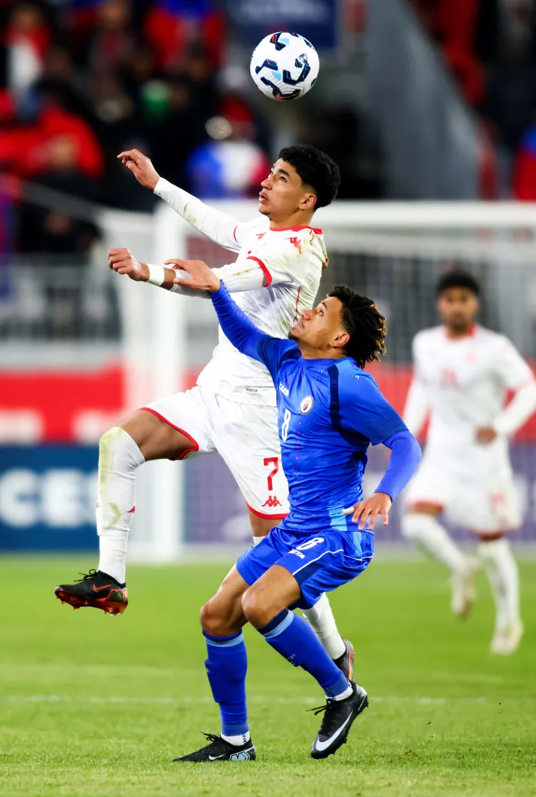Soccer Football - International Friendly - Haiti v Tunisia - Toronto Stadium, Toronto, Canada - March 28, 2026 Tunisia's Khalil Ayari in action with Haiti's Martin Experience REUTERS/Cole Burston