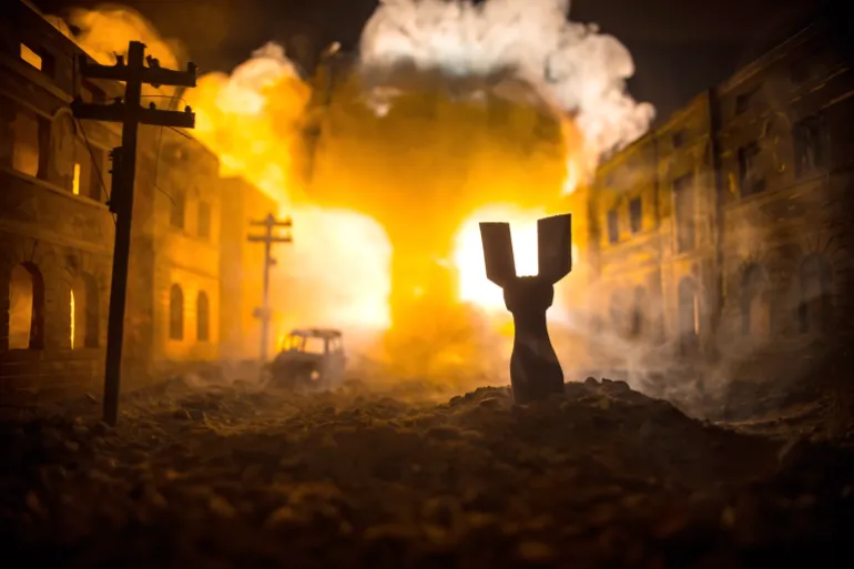 Nuclear war apocalypse concept. Explosion of nuclear bomb in city. City destroyed by atomic war. Creative artwork decoration in dark. Selective focus