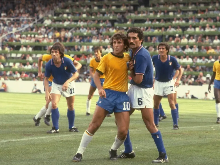 5 Jul 1982: Zico (left) of Brazil and Claudio Gentile of Italy mark each other during the World Cup Second Round match at the Sarria Stadium in Barcelona, Spain. Italy won the match 3-2. Mandatory Credit: Allsport UK /Allsport