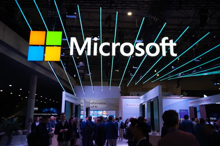 The Microsoft logo is on display at the Mobile World Congress in Barcelona, Spain, on February 26, 2024. The 2024 edition of the Mobile World Congress, which is focusing on artificial intelligence and the new uses of 5G and 6G, is currently underway. The congress is also presenting the first flying car, and artificial intelligence applications are taking center stage. The organizers are expecting to attract 95,000 visitors to this edition. (Photo by Charlie Perez/NurPhoto via Getty Images)
