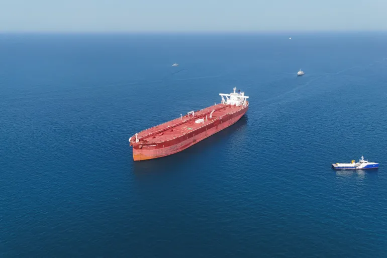 A drone view shows the Malta-flagged tanker Agios Fanourios I, an oil tanker that sailed through the Strait of Hormuz, arriving in Iraq’s territorial waters off Basra, Iraq, April 17, 2026. REUTERS/Mohammed Aty