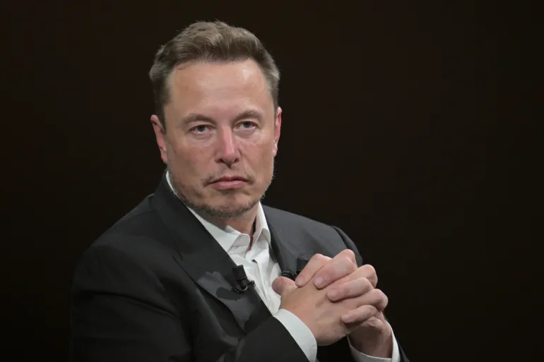 (FILES) SpaceX, Twitter and electric car maker Tesla CEO Elon Musk looks on as he speaks during his visit at the Vivatech technology startups and innovation fair at the Porte de Versailles exhibition center in Paris, on June 16, 2023.