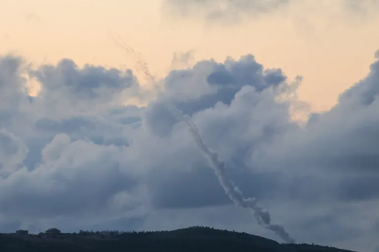 A photograph taken from the southern Lebanese area of Marjeyoun shows trails of rockets fired from Lebanon towards Israel on April 6, 2026.