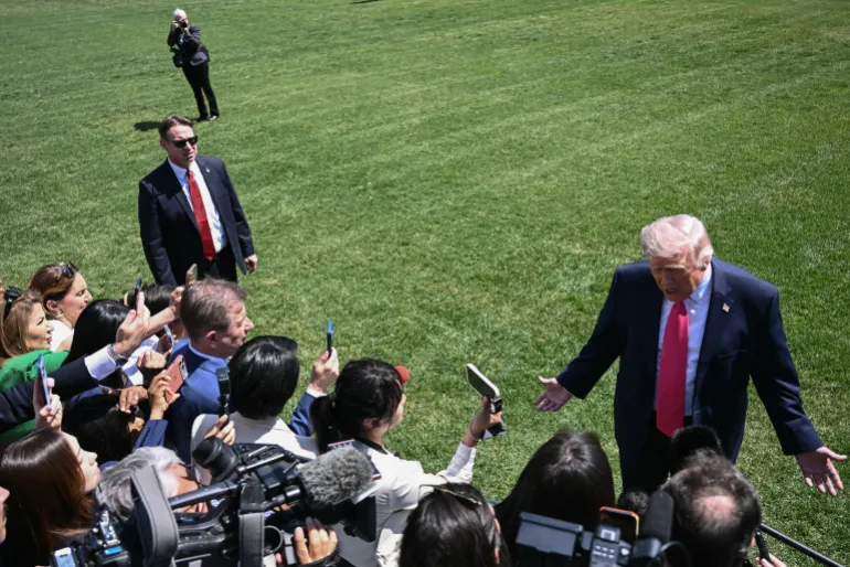 US President Donald Trump speaks to reporters before walking to board Marine One as he departs from the South Lawn of the White House in Washington, DC, on April 16, 2026.