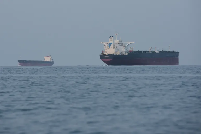 Tankers anchored in the Strait of Hormuz off the coast of Qeshm Island, Iran, Saturday, April 18, 2026. (AP Photo/Asghar Besharati)
