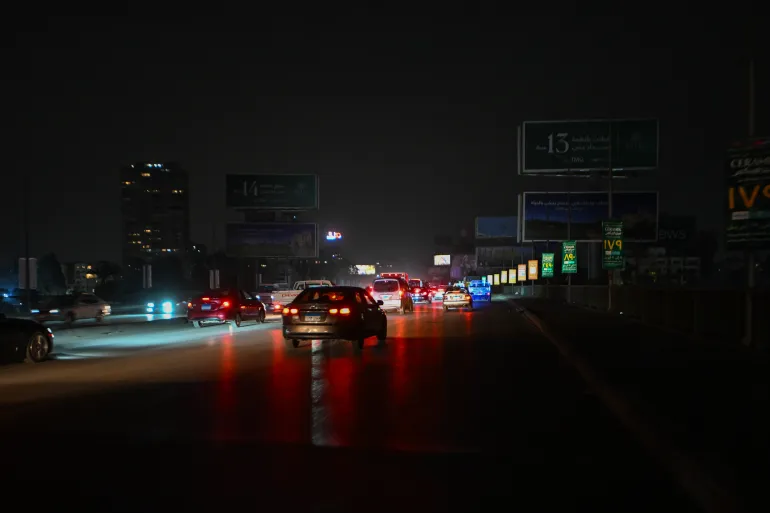 CAIRO, EGYPT - MARCH 28: Turning off advertising sign lights in Cairo, on March 28, 2026 in Cairo, Egypt. The Egyptian Prime Minister has confirmed that all commercial establishments such as malls, shops and cafes will close at 2100, except Thursday and Friday, when they will close at 2300, from today for a month to ration electricity consumption due to the shortage of petroleum products resulting from the ongoing war between US/Israel and Iran. (Photo by Sayed Hassan/Getty Images)