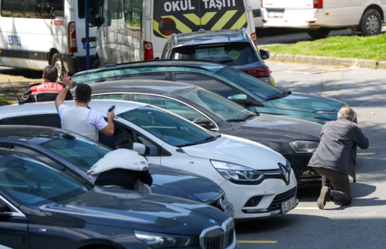 Police in action at the scene, after gunfire was heard near the building housing the Israeli consulate, according to a witness, in Istanbul, Turkey, April 7, 2026. REUTERS/Murad Sezer